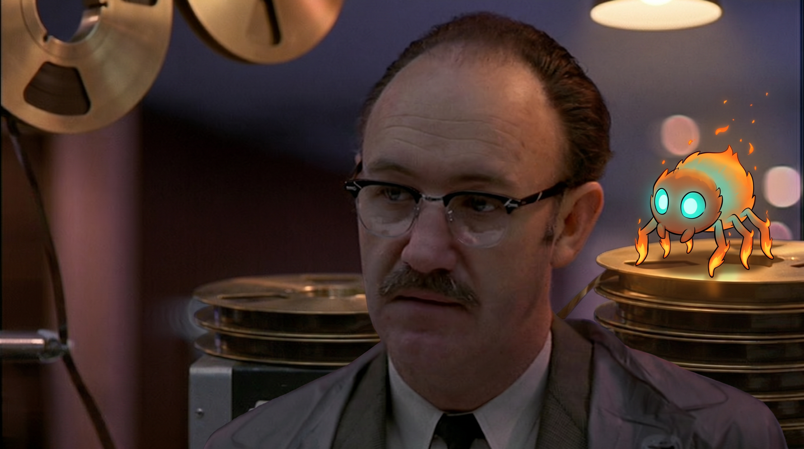 Gene Hackman as Harry Caul in The Conversation sits beside a brass reel-to-reel tape machine. A small cartoon &lsquo;Firecrawler&rsquo; creature with glowing cyan eyes perches on the reel, reading the tape.